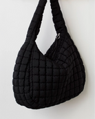 Free People Quilted Carryall Bag in Black