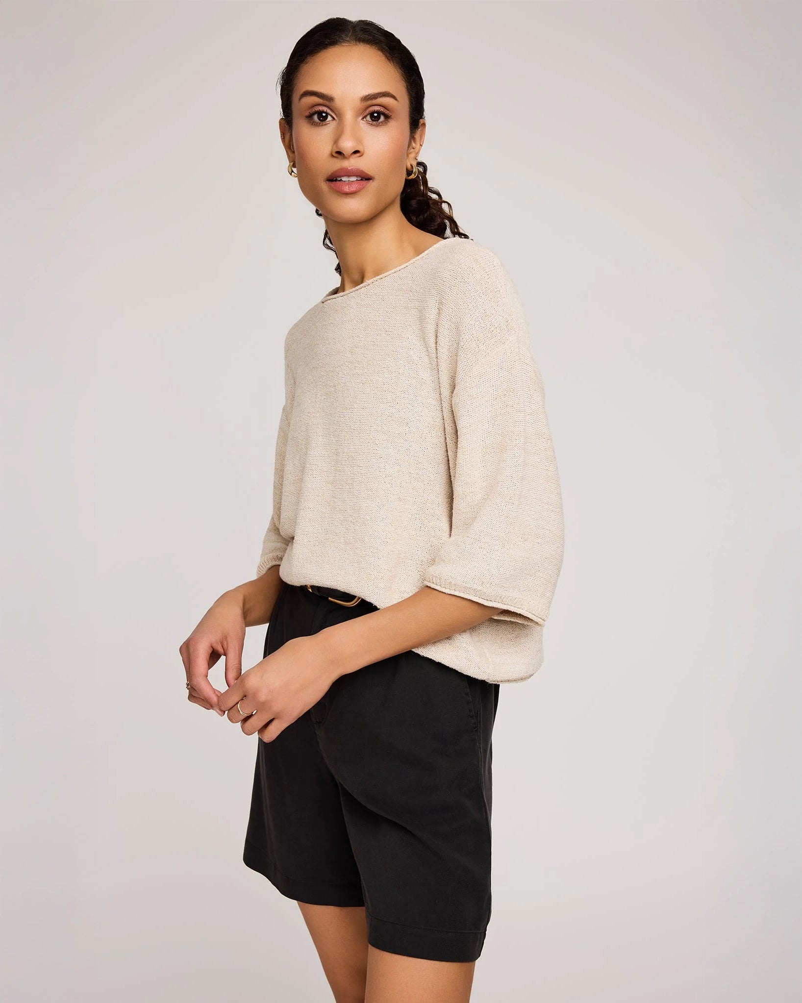 woman wearing beige knit sweater by Gentle Fawn