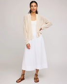 Gentle Fawn Open Knit Cream Cardigan over white dress