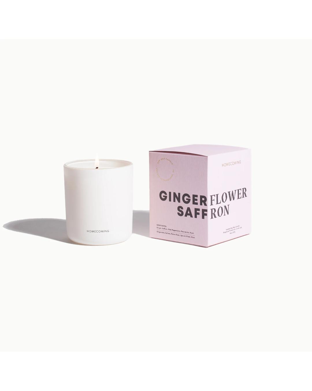 candle beside pink box