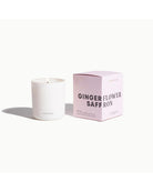 candle beside pink box
