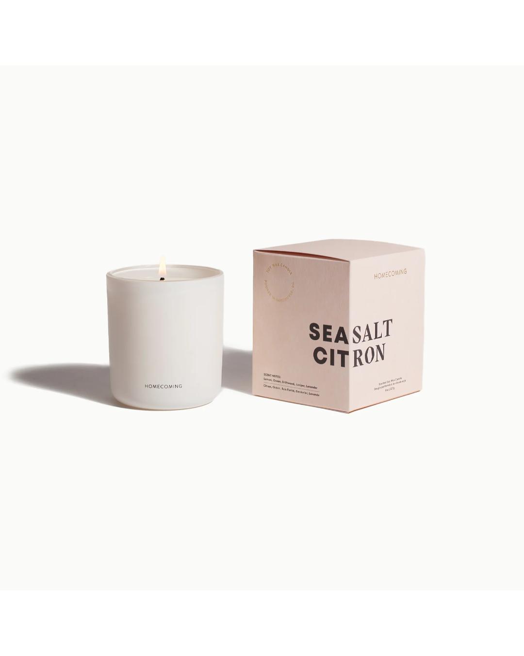 white candle with pink box