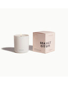 white candle with pink box