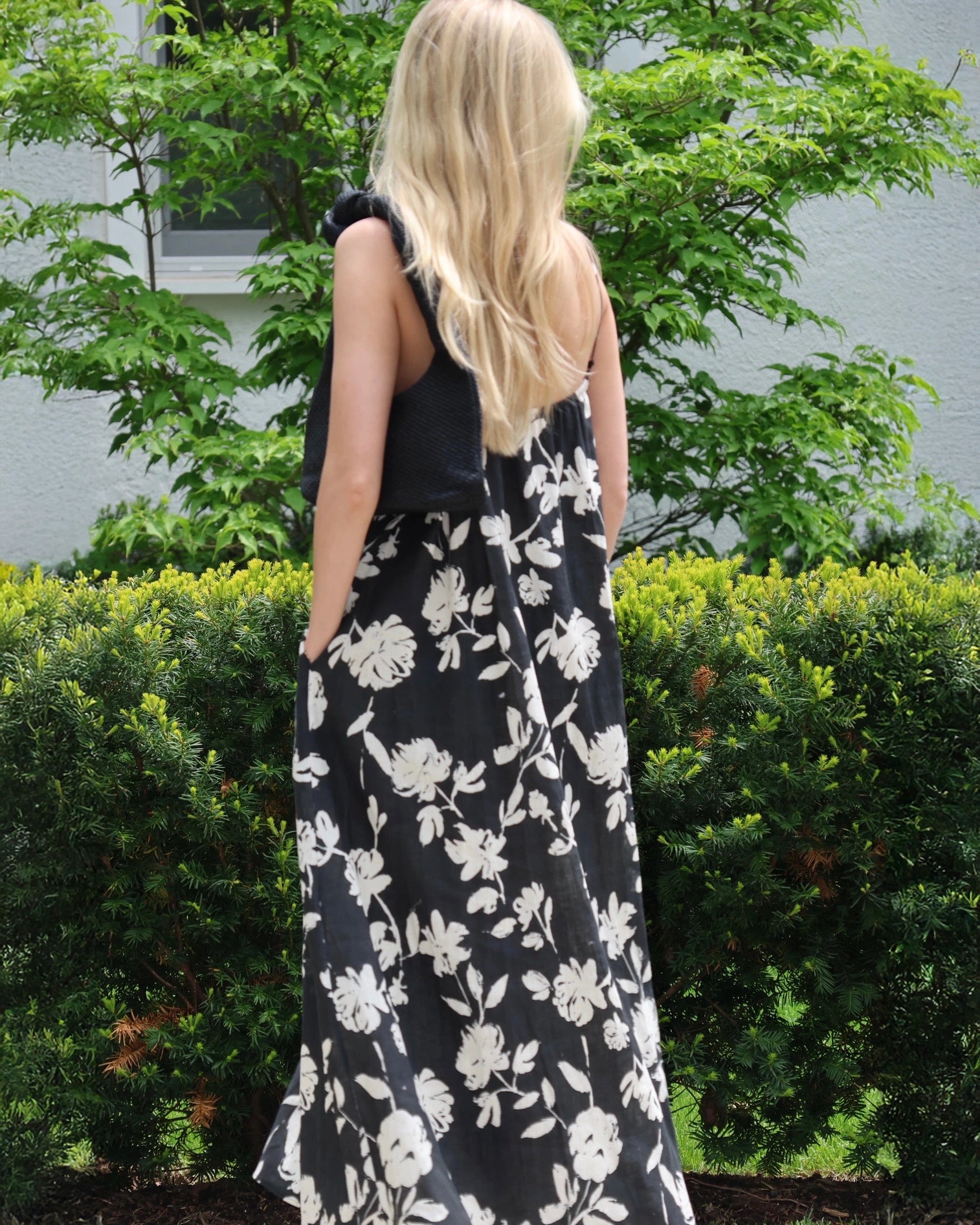 Woman wearing a black and white floral dress