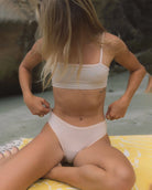woman wearing beige bikini underwear in modal by Huha with matching bralette