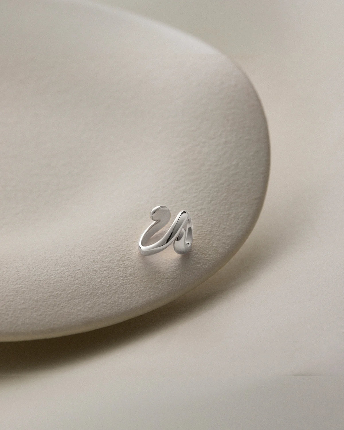 statement swirl silver ear cuff