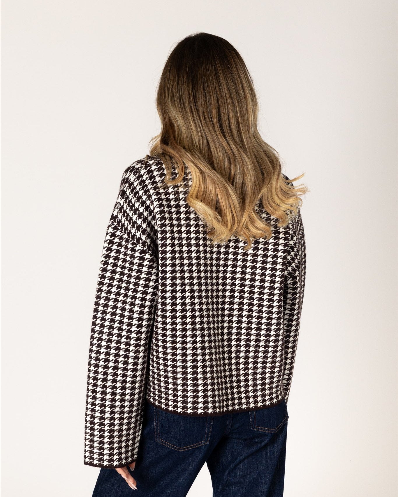short coat in brown and white houndstooth design
