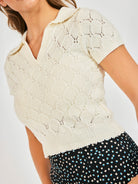 Short sleeve cream knit sweater with a collar 