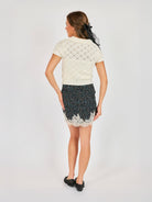 Short sleeve cream knit sweater with a collar 