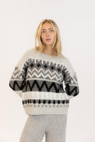 grey and black sweater
