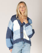 chunky knit cardigan with large checkered print in blue and white
