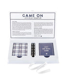 A playing card game set called 'Lake Game Night' that shows rules and the 2 sets of cards and 4 dice included