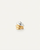 two ear cuffs one in silver and the other in gold