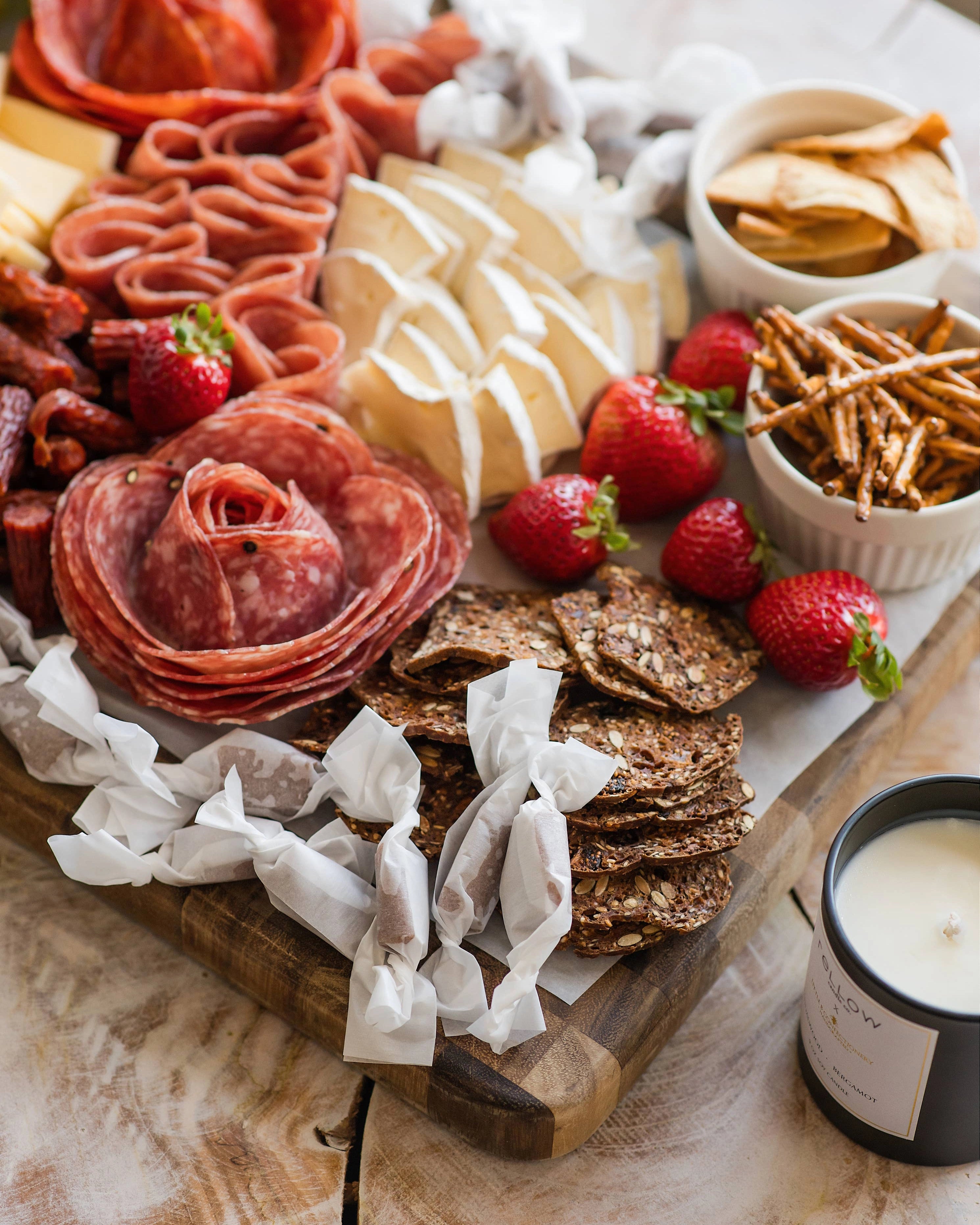 Charcuterie board with caramels wrapped up