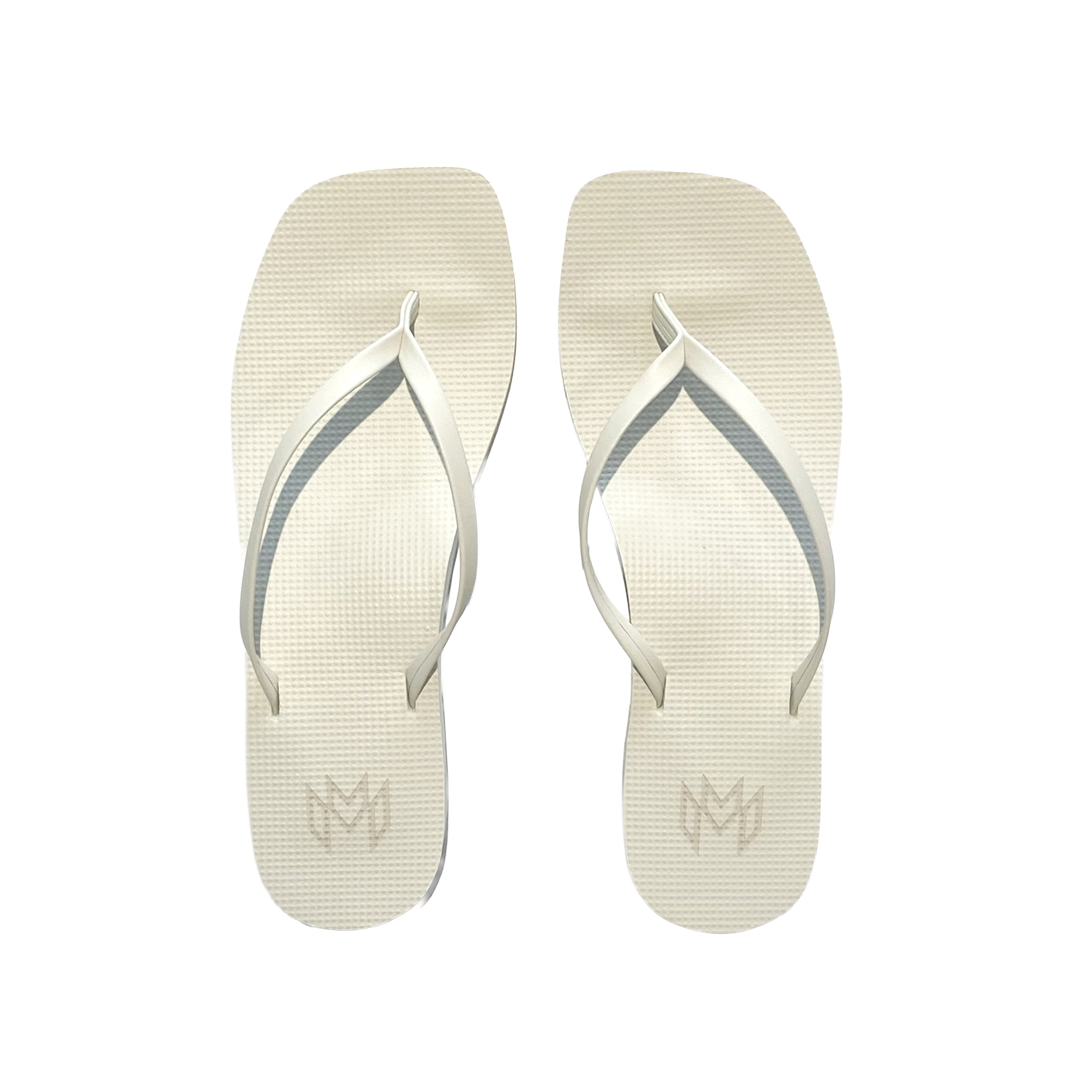 off white flip flops with a square toe