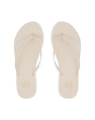 A pair of cream flip flops, viewed from above.