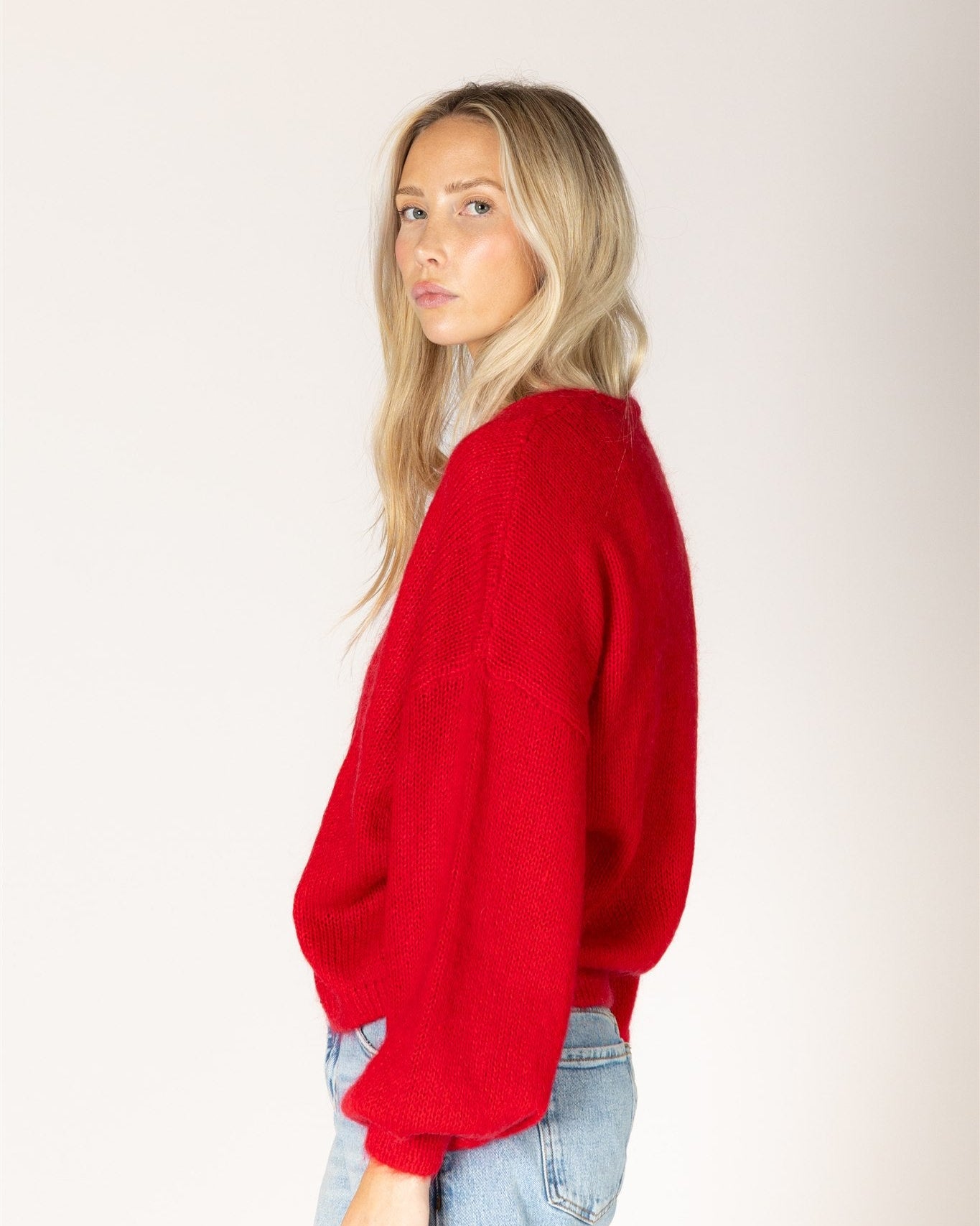 red knit open cardigan