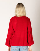 red knit open cardigan