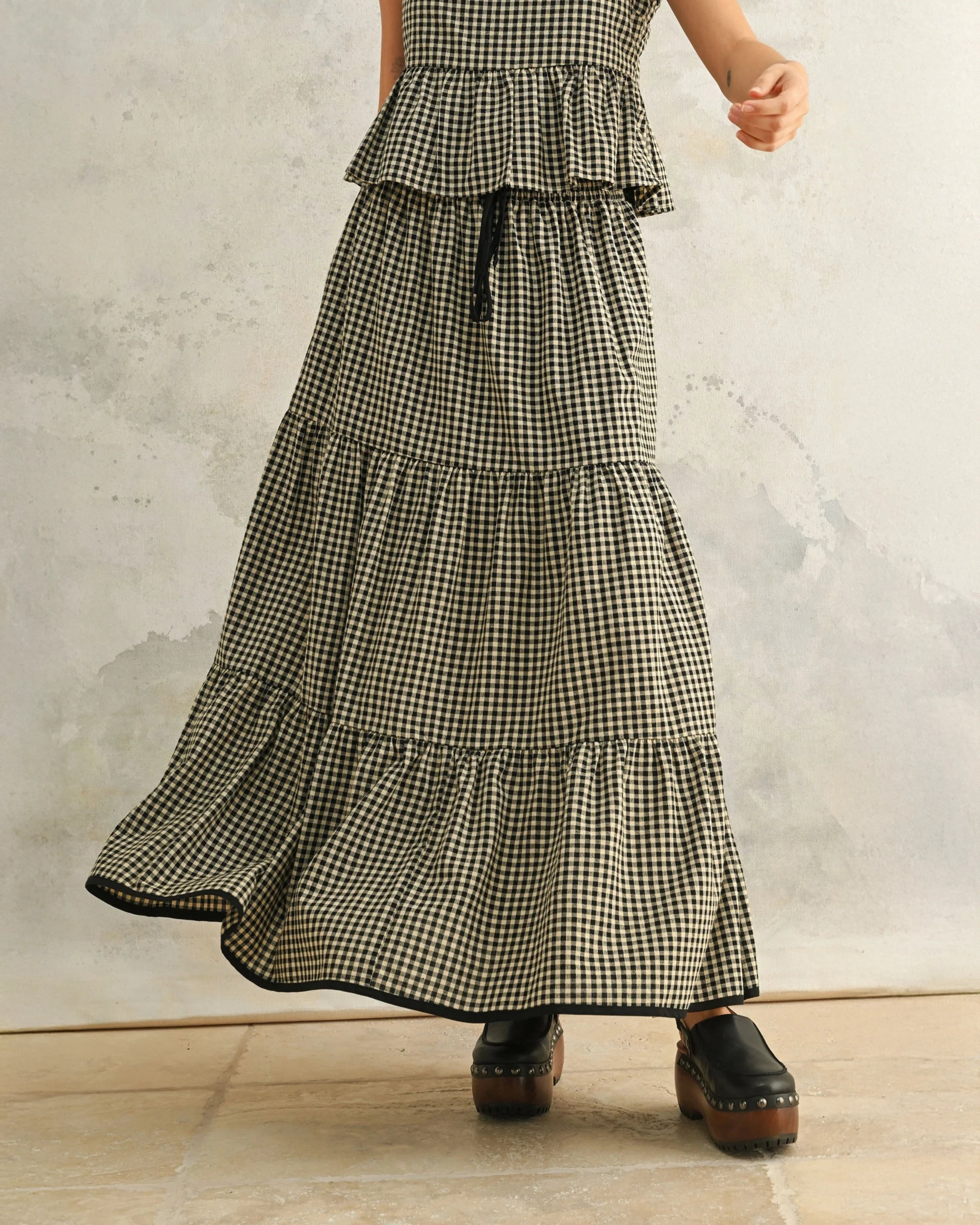Long gingham skirt with tiered ruffles