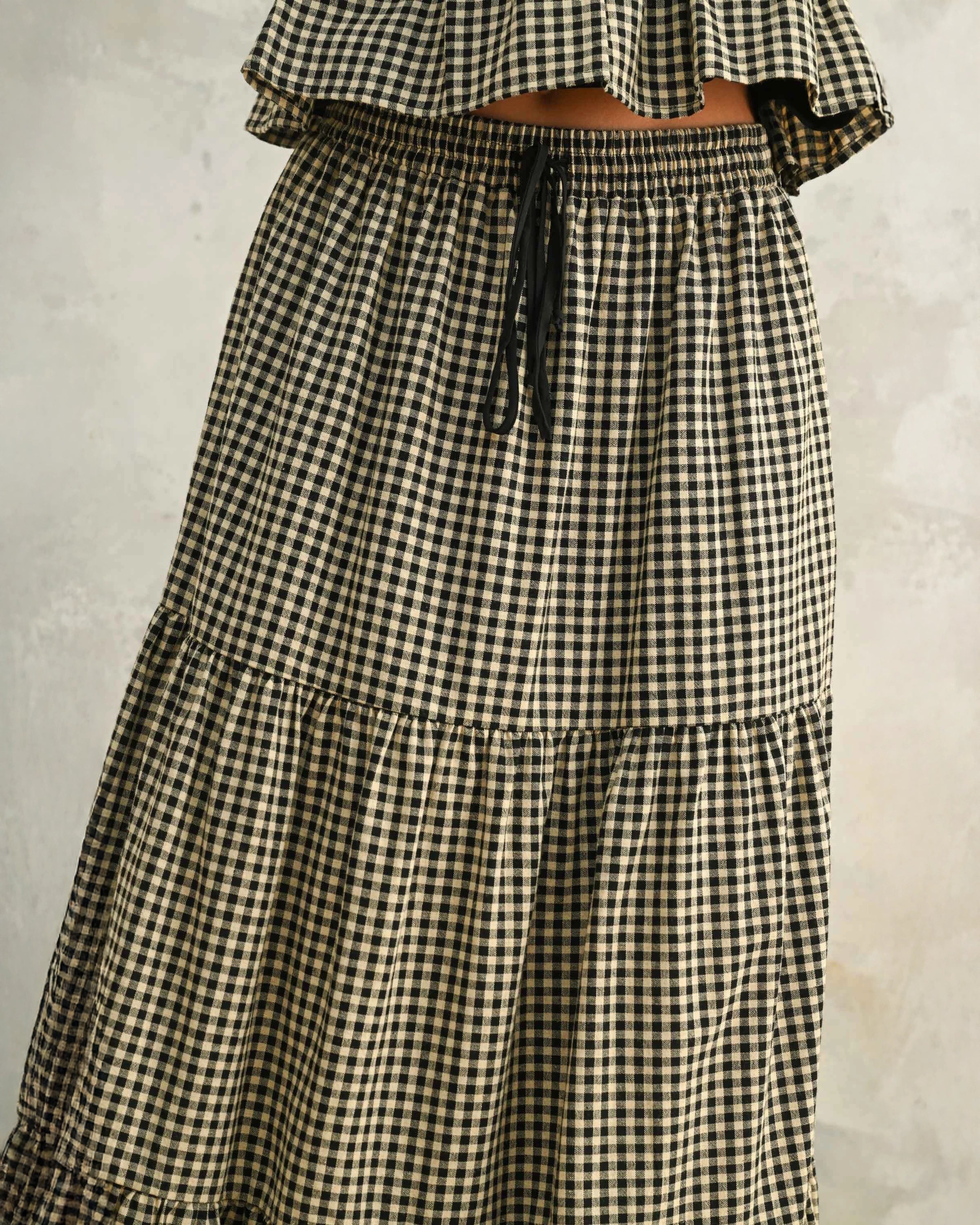 Long gingham skirt with tiered ruffles