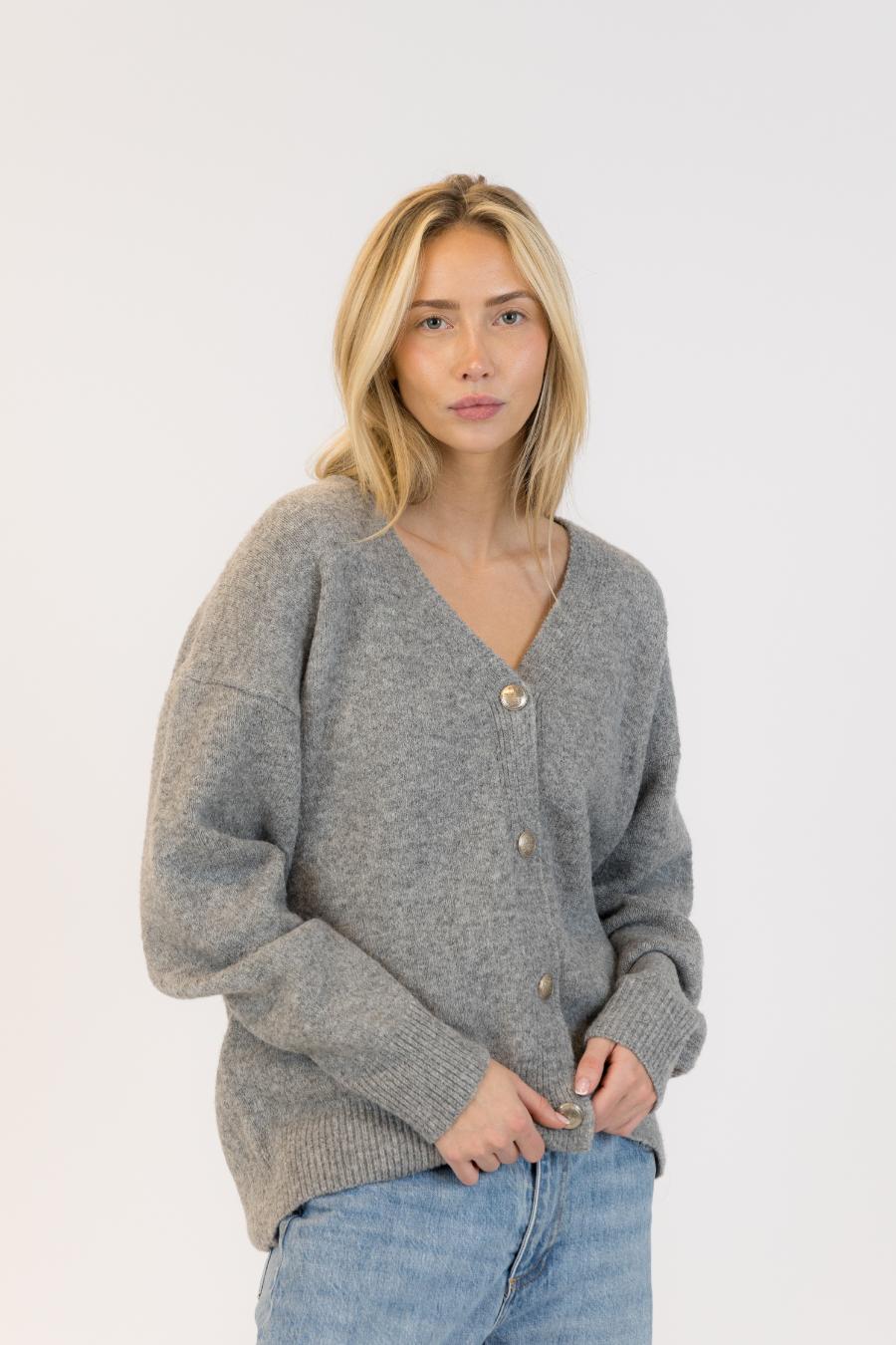 grey cardigan with silver buttons