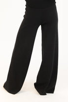 back view of black knit wide leg pant