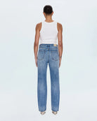 a woman wearing high rise straight jeans from Pistola