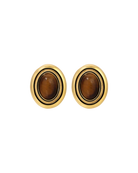 large oval earring with gold outline and brown stone in the middle