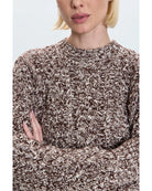 brown and white knit sweater 