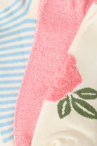 three pack of angle socks in white, blue and pink