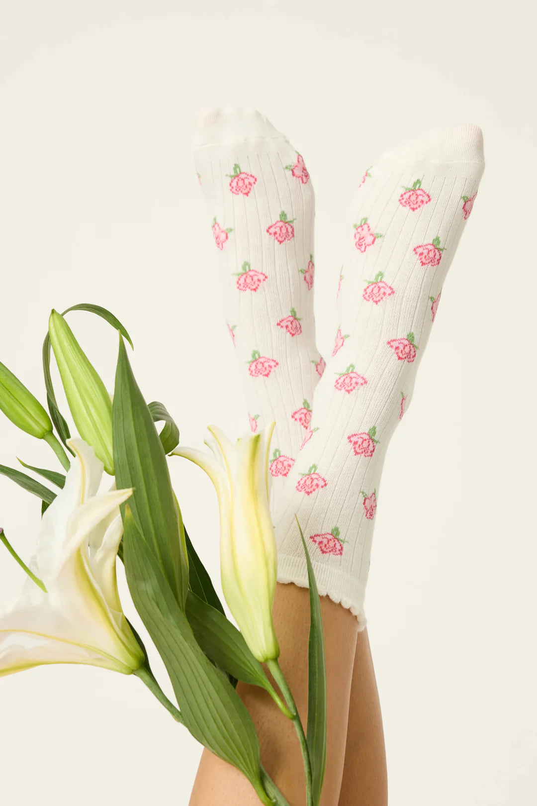 high crew socks in white with pink flowers