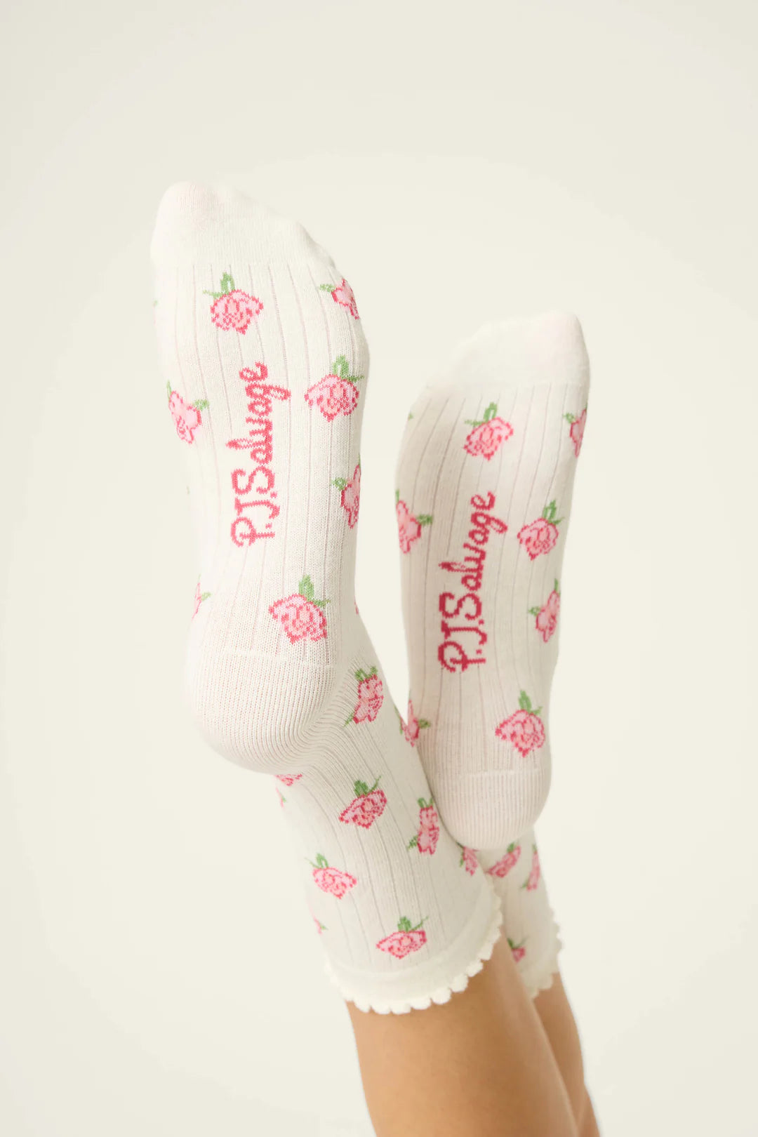 high crew socks in white with pink flowers