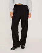 a pair of pleated black elasticated pants by Rails
