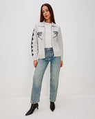 Grey zip up sweater with two skiiers on the chest in blue