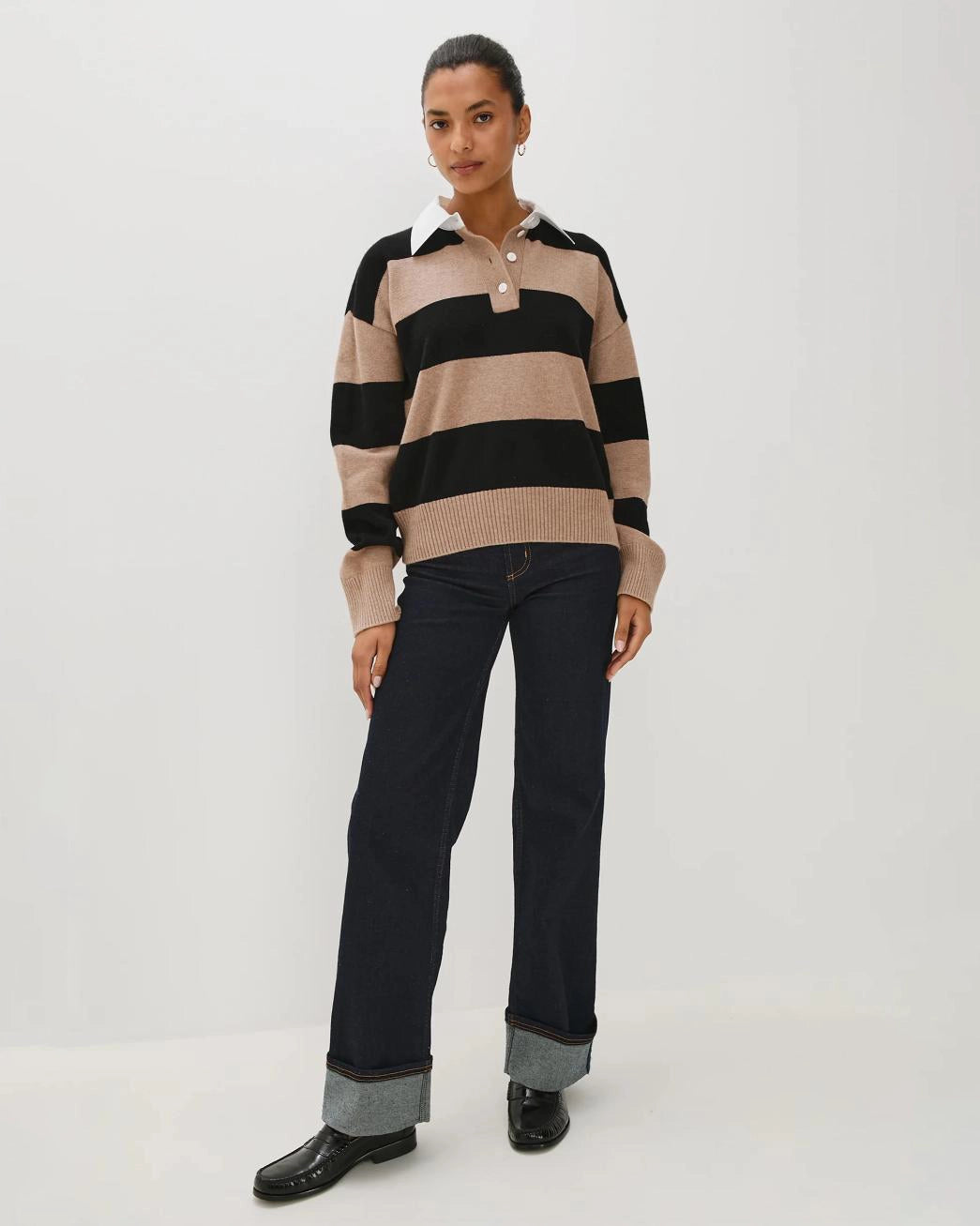 woman wearing a cashmere and wool striped rugby sweater by Rails
