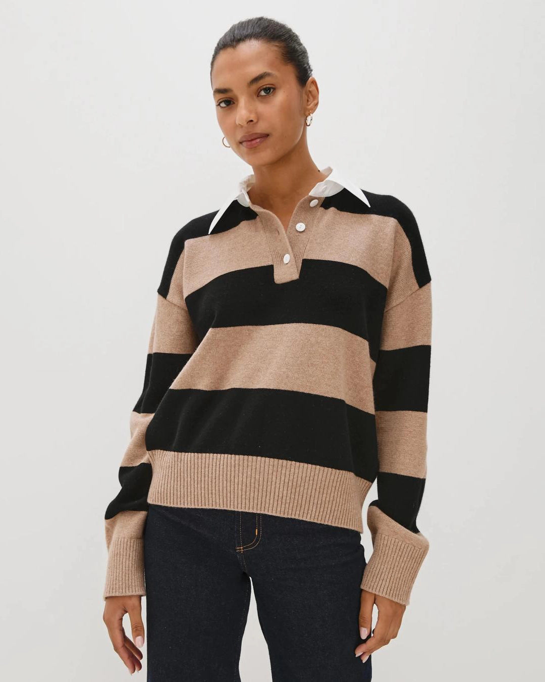 woman wearing a cashmere and wool striped rugby sweater by Rails