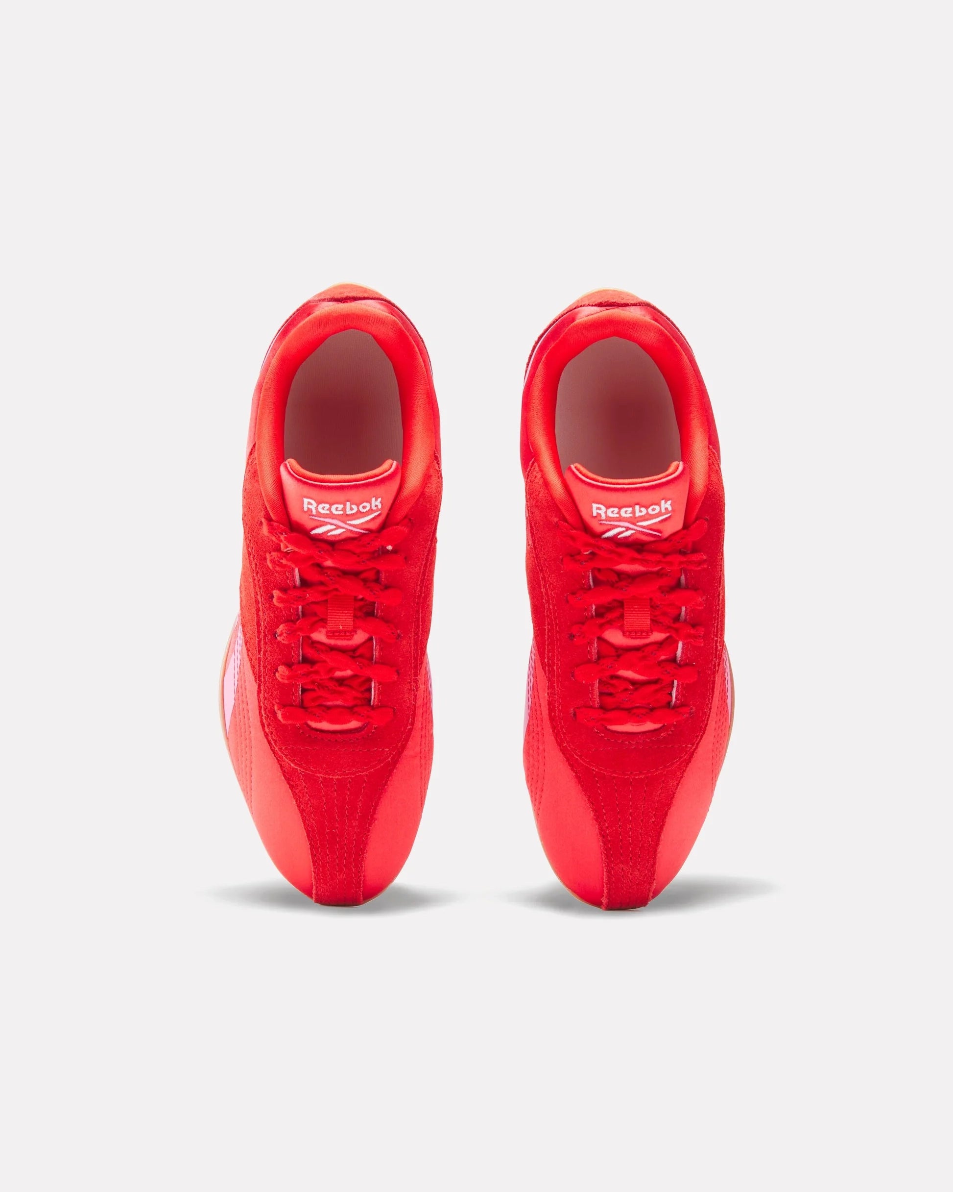 Red Reebok Ultra Lo Sneaker with pink details and rubber sole