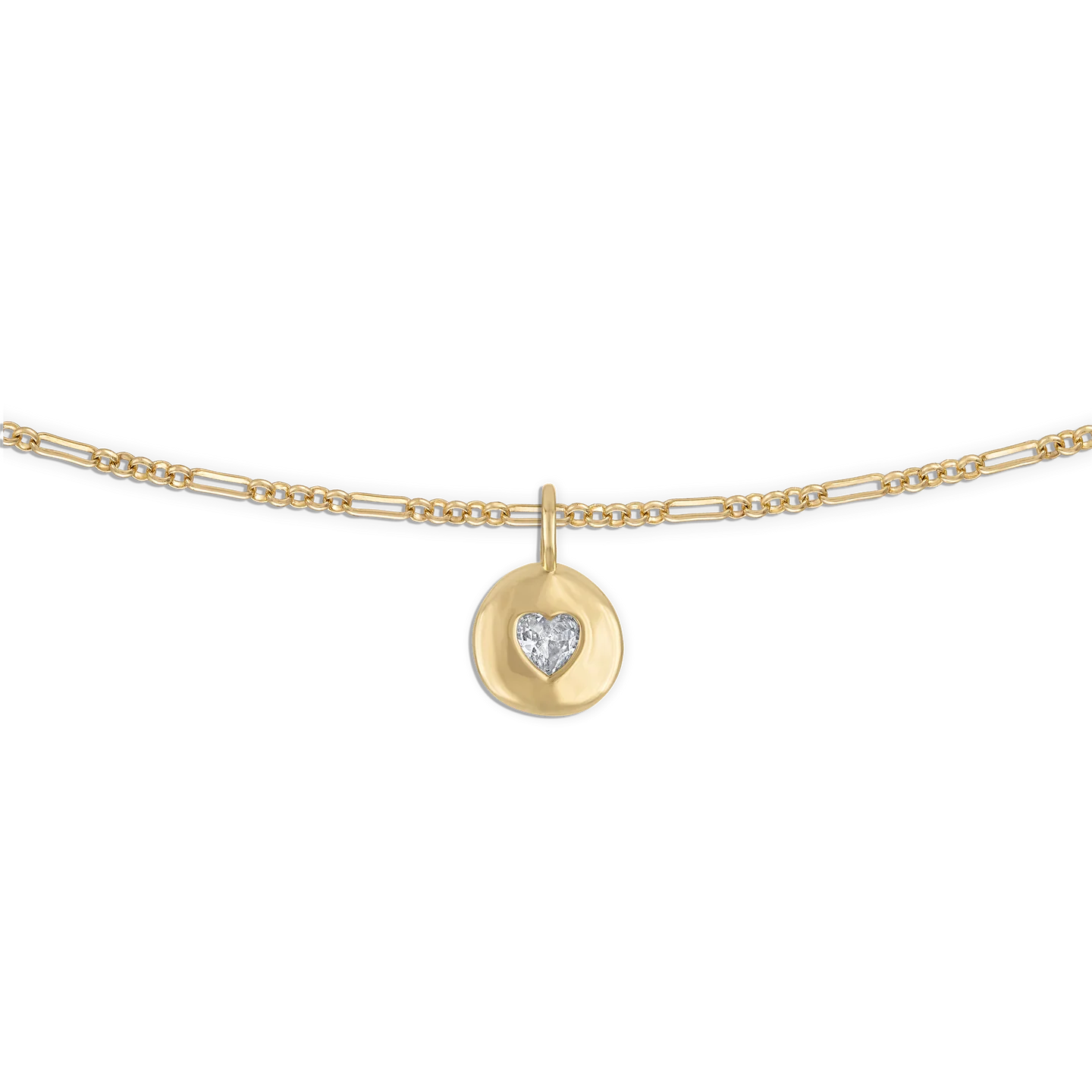 gold necklace with a round pendent with a heart in the middle