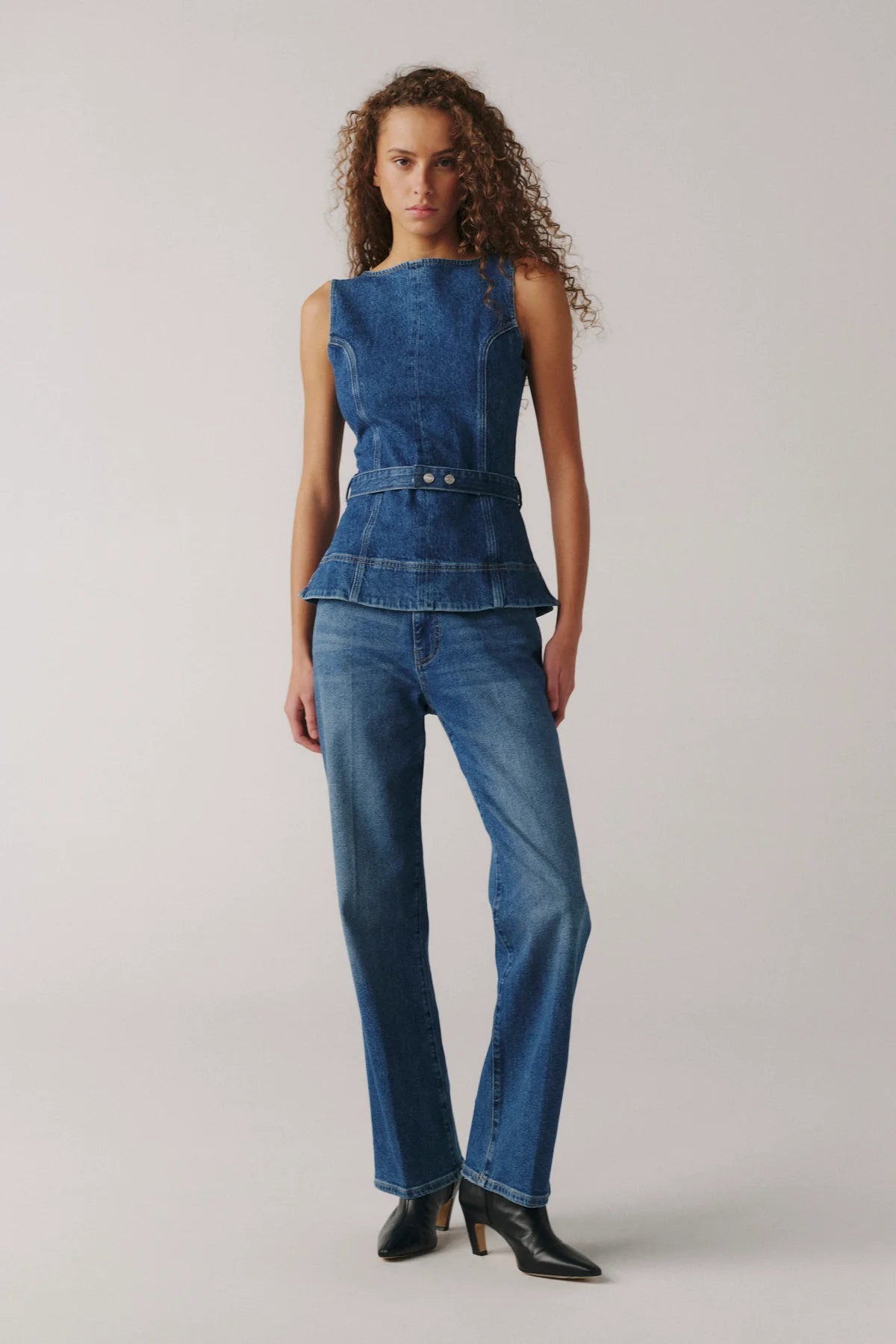 high rise medium wash denim pant with a straight leg