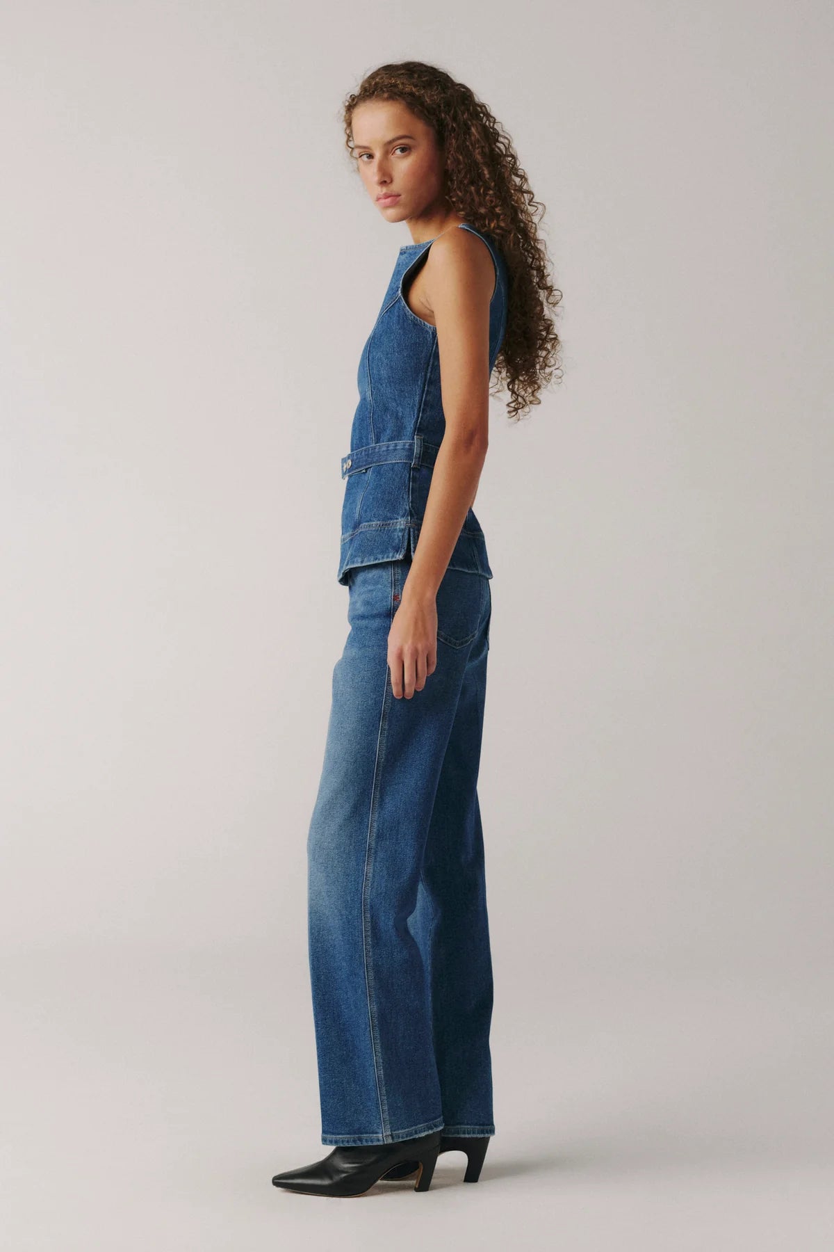 high rise medium wash denim pant with a straight leg