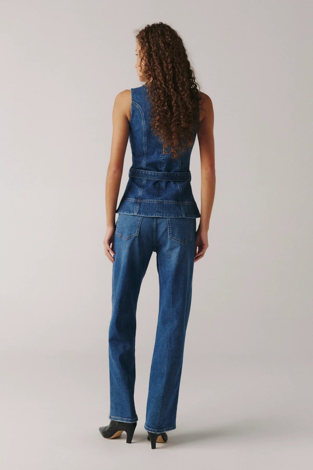 high rise medium wash denim pant with a straight leg