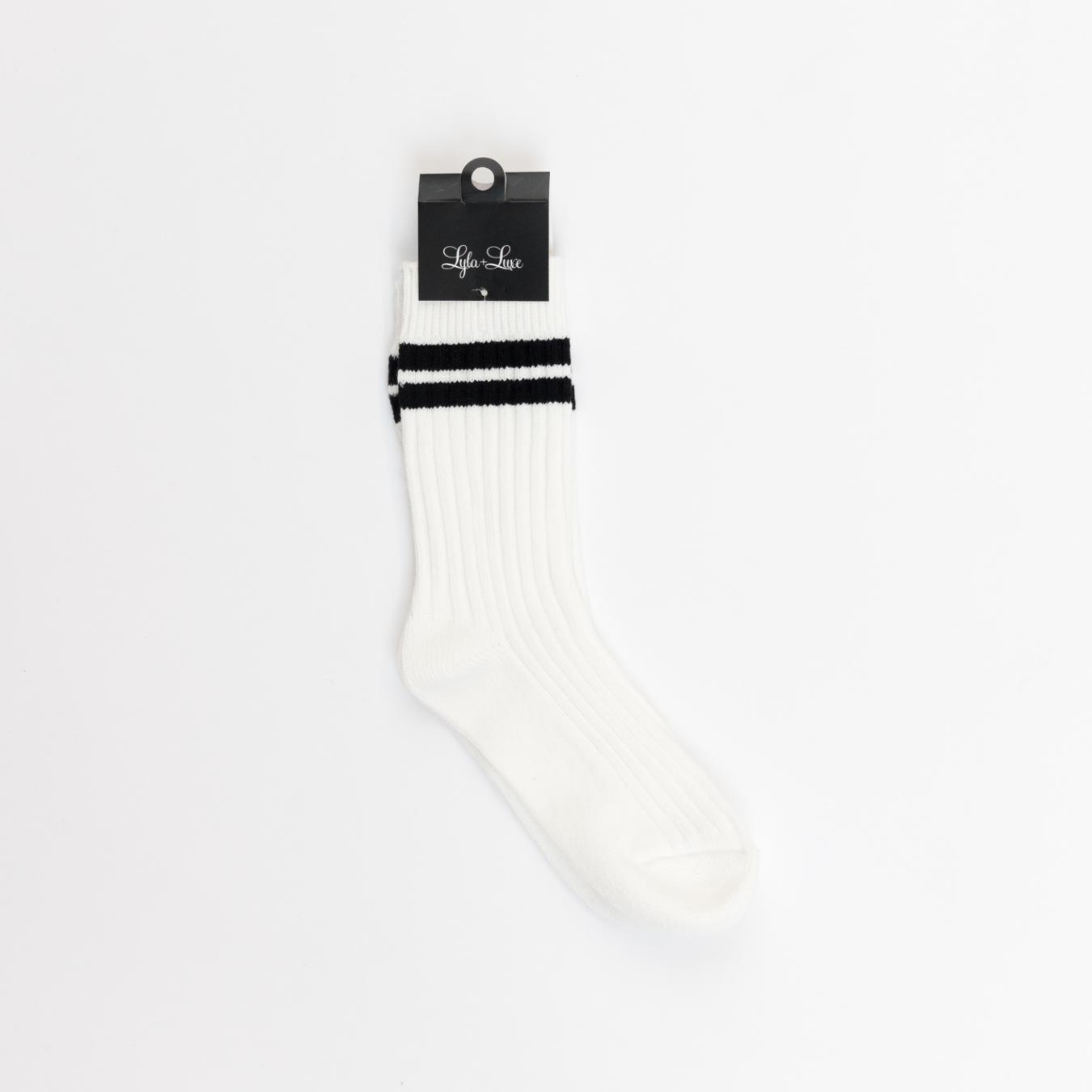 white crew socks with black stripe at the top