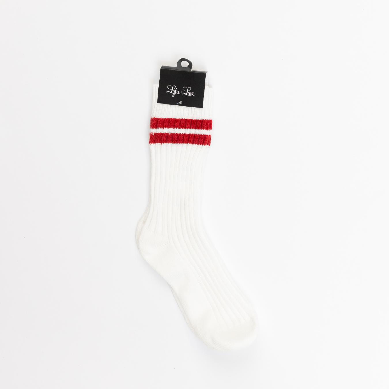 white crew socks with red stripes at the top 
