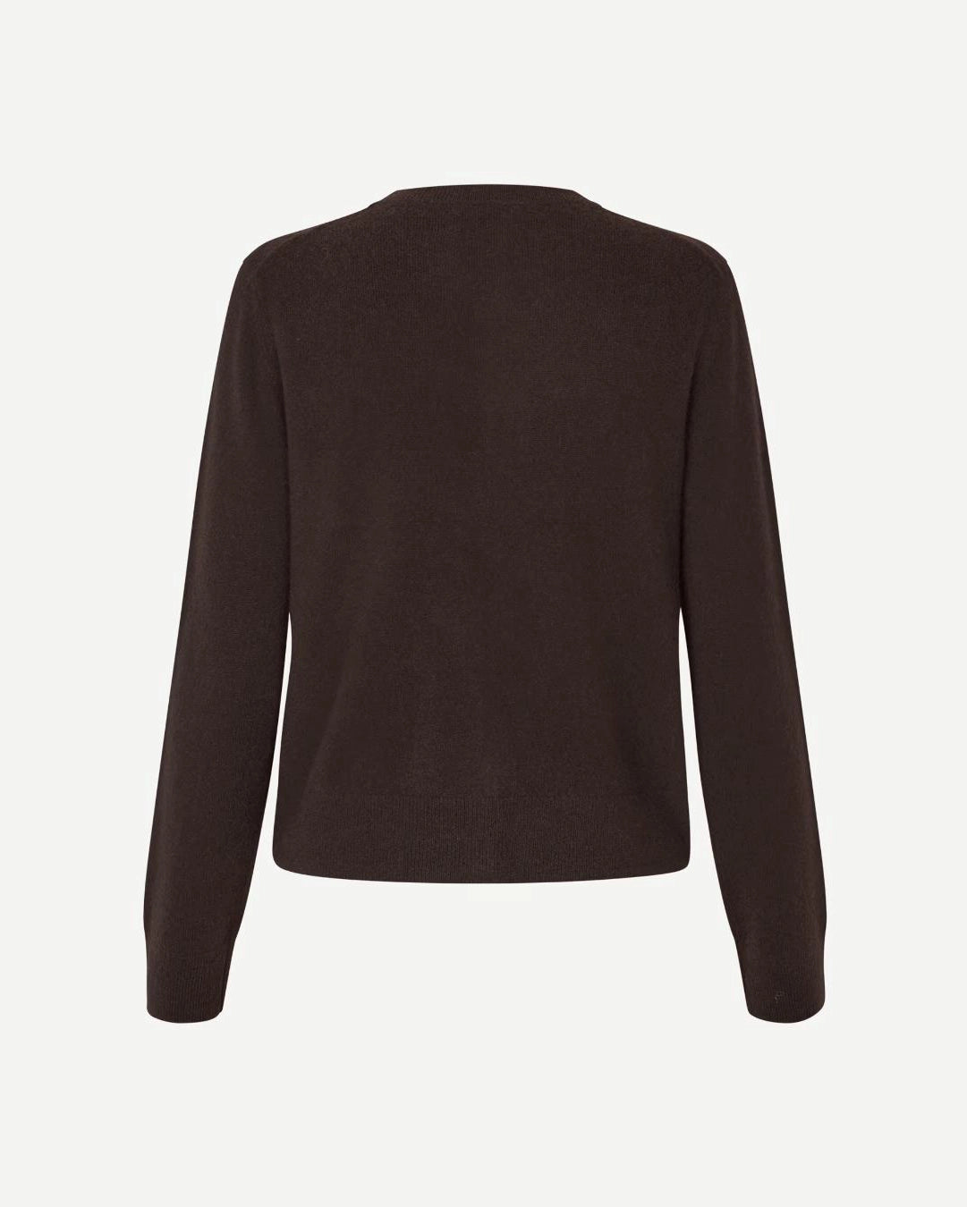 Woman wearing a brown button-up cashmere cardigan by Samsoe Samsoe