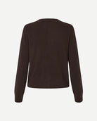 Woman wearing a brown button-up cashmere cardigan by Samsoe Samsoe