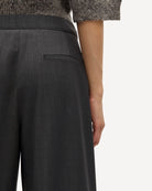 woman wearing grey high-waisted Saroko pants by Samsøe Samsøe