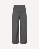 a pair of grey high-waisted Saroko pants by Samsøe Samsøe