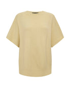 a light yellow oversized cashmere tee sweater