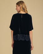 black velvet short sleeve top with lace trim on bottom
