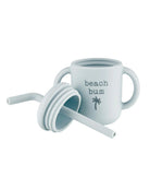 a picture of a silicone baby cup with straw that says beach bum on it